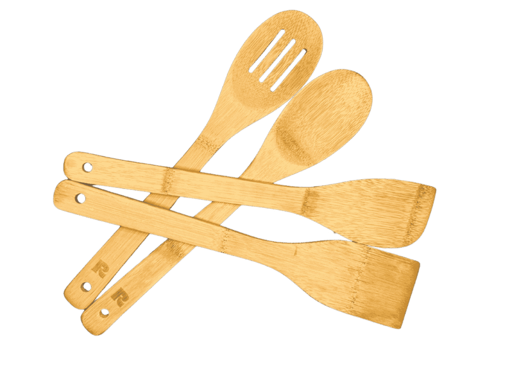 Set of bamboo kitchen cooking spoons and spatulas arranged together